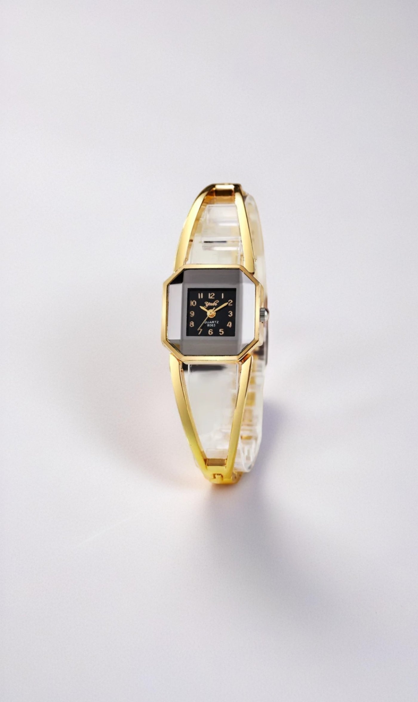 Gold-Toned Metal Ladies Watch With unique, geometric Design